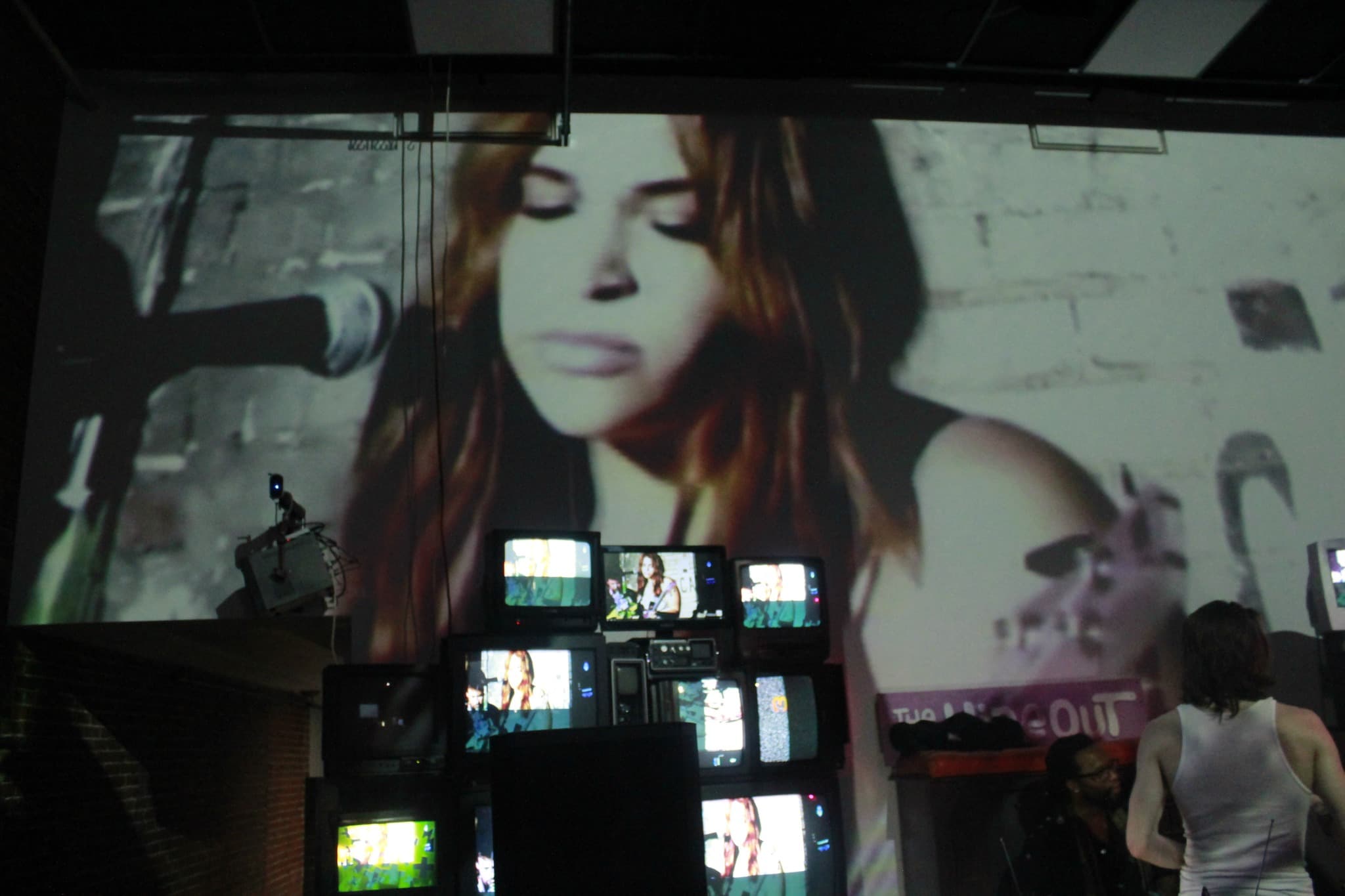 Deja Blue performing live on stage at TinyStage